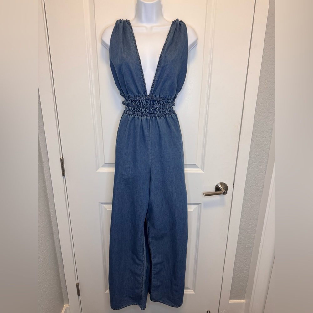 Blue Denim Jumpsuit with Deep V-Neck